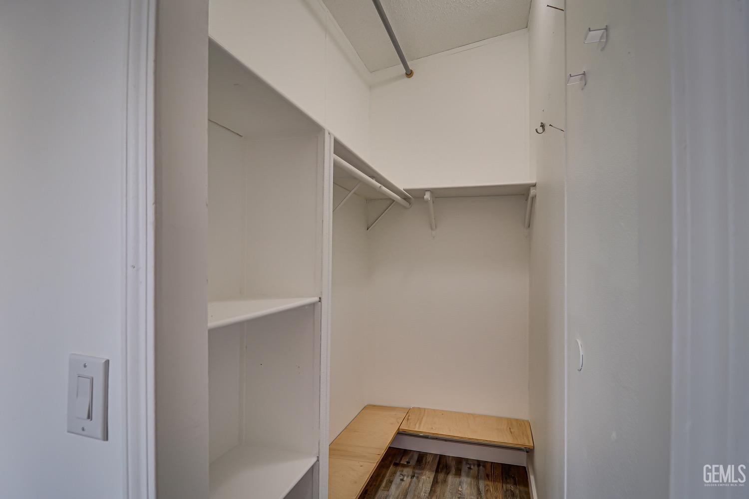 Undisclosed Address Bakersfield, CA 93314 - Photo 23 of 27 a view of an empty walk in closet