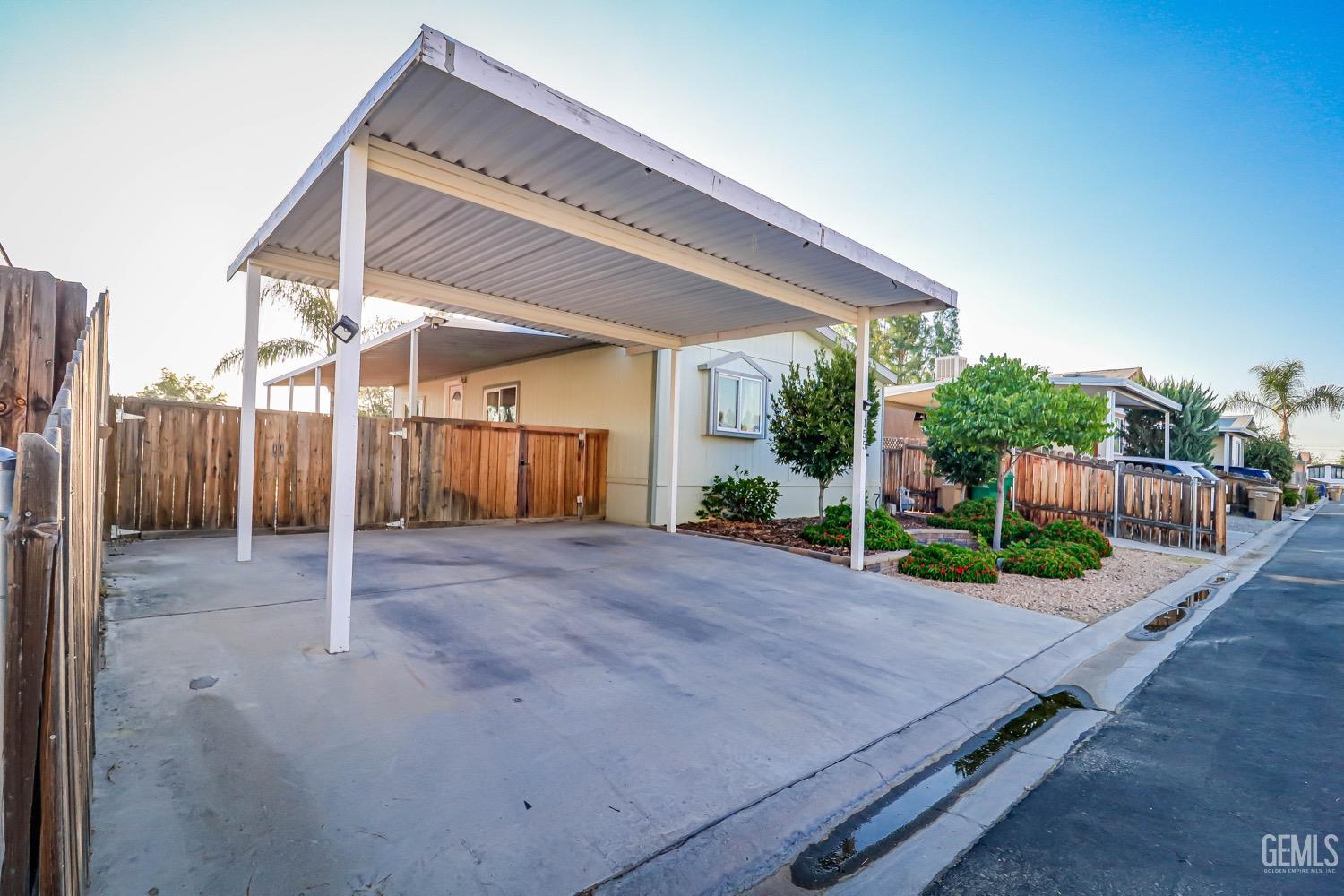 Undisclosed Address Bakersfield, CA 93314 - Photo 4 of 27 a view of a house with porch
