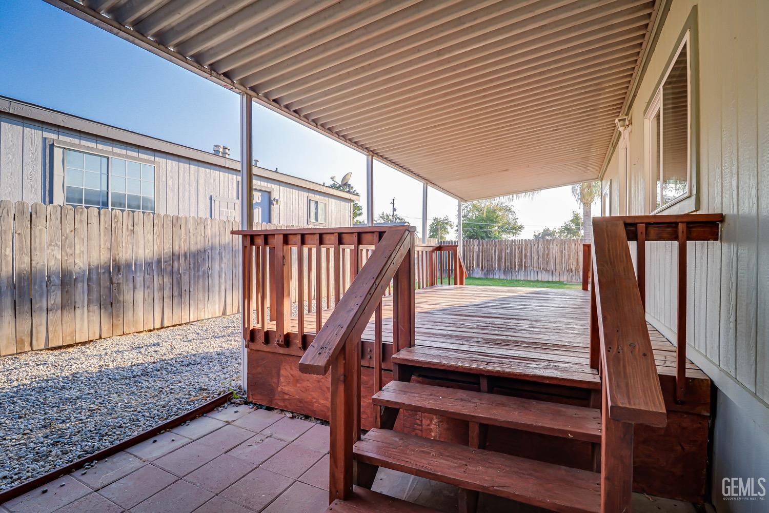 Undisclosed Address Bakersfield, CA 93314 - Photo 5 of 27 a view of outdoor space with wooden floor and iron stairs