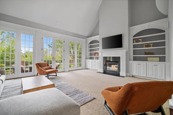 a bath tub sitting next to a window