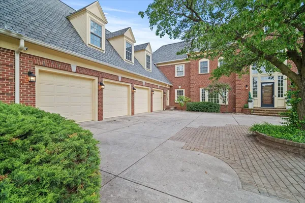 a utility room with sink dryer and washer