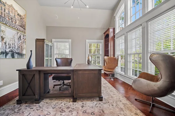 a bedroom with a bed and cabinets