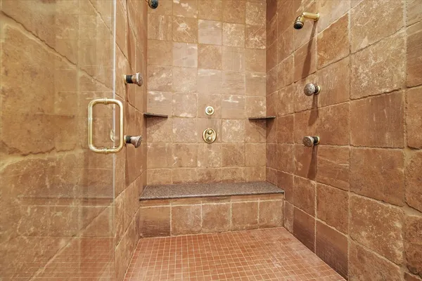 a bathroom with a sink vanity and a mirror