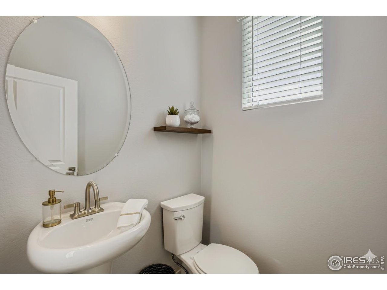 2291 East Suniga Road Fort Collins, CO 80524 - Photo 12 of 25 Main level powder room