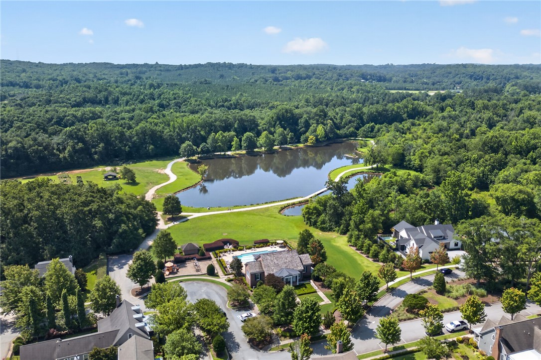 112 Tuttle Street Clemson, SC 29631 - Photo 44 of 46 Lush woodlands embrace this community, offering serene lake views and inviting pathways.