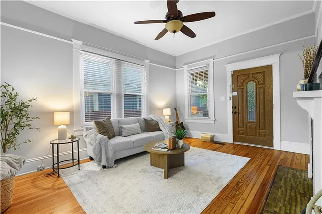 a living room with furniture and a window