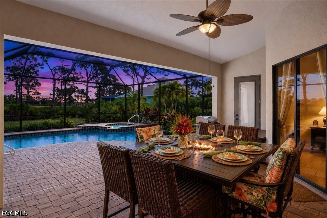 6109 Calusa Rdg Trail Bokeelia, FL 33922 - Photo 40 of 48 a view of a dining room with furniture window and outdoor kitchen
