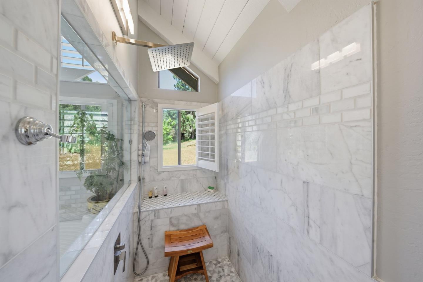 701 Day Valley Road Aptos, CA 95003 - Photo 21 of 43 a bathroom with a bathtub and a shower