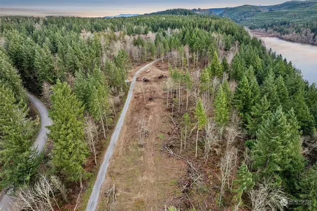 a view of a chairs and table in patio