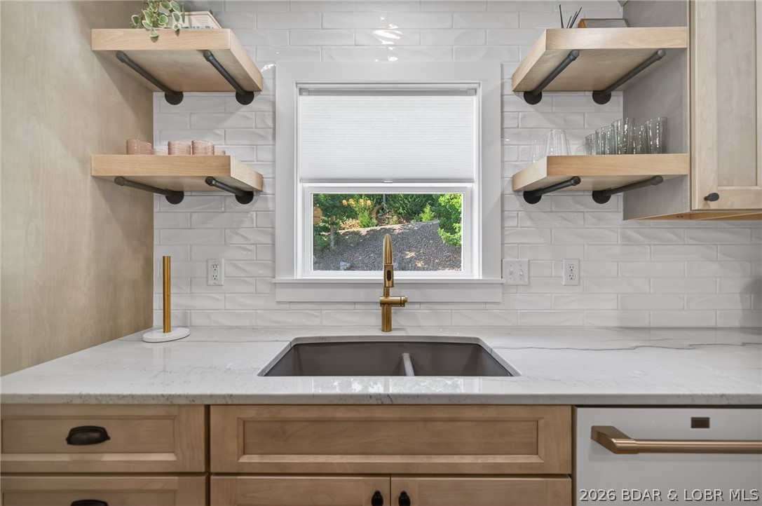 25 Old Sassafrass Road Eldon, MO 65026 - Photo 21 of 58 Oversize sink with window lookout, floating shelve