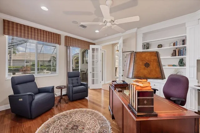 a view of a house with backyard sitting area and garden