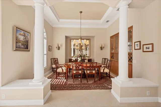 a view of a dining room with furniture window and outside view
