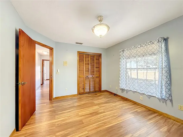 an empty room with windows