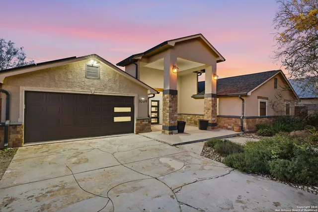 a front view of a house with yard
