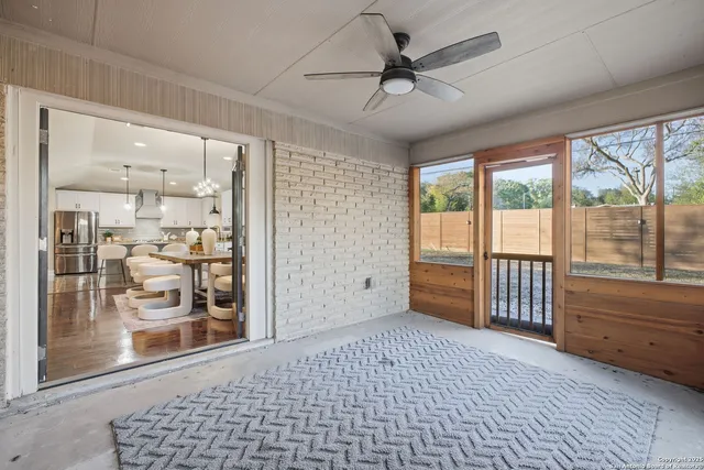 a view of empty room with windows