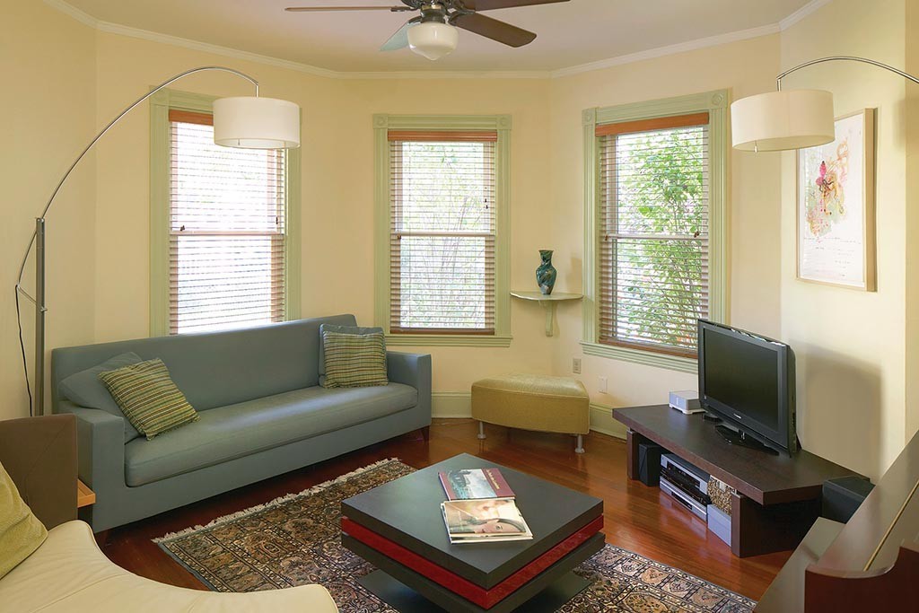 32 Stanton Road, Unit 1 Brookline, MA 02445 - Photo 2 of 6 a living room with furniture a flat screen tv and a window