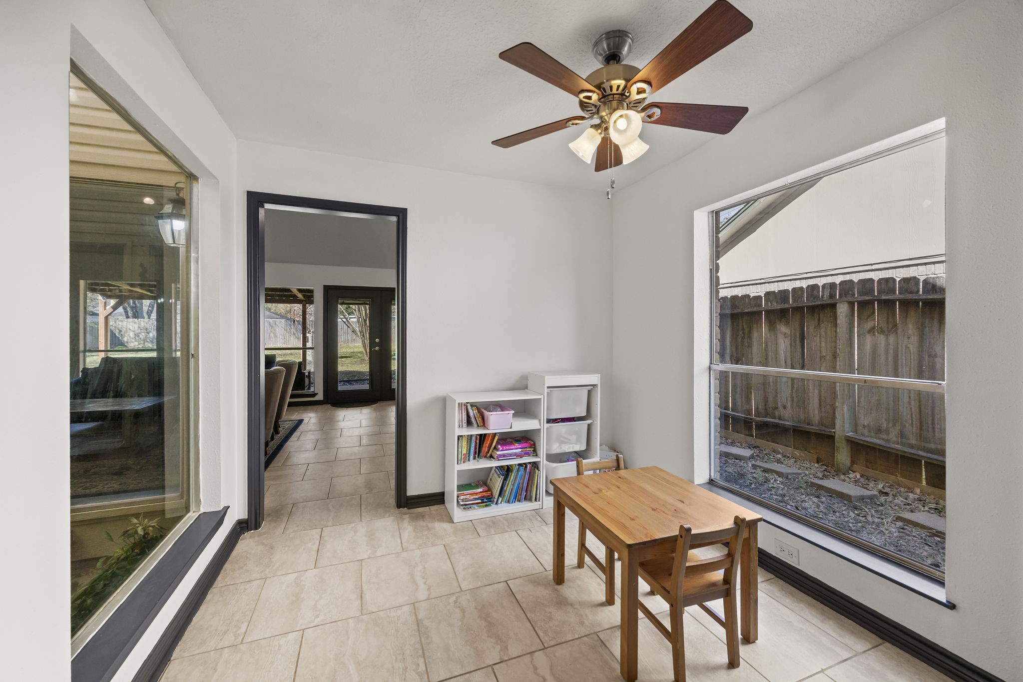 810 Hidden Canyon Road Katy, TX 77450 - Photo 14 of 33 The breakfast area offers a cozy yet functional dining nook, perfectly positioned beside the kitchen and anchored by a large window that brings in natural light.