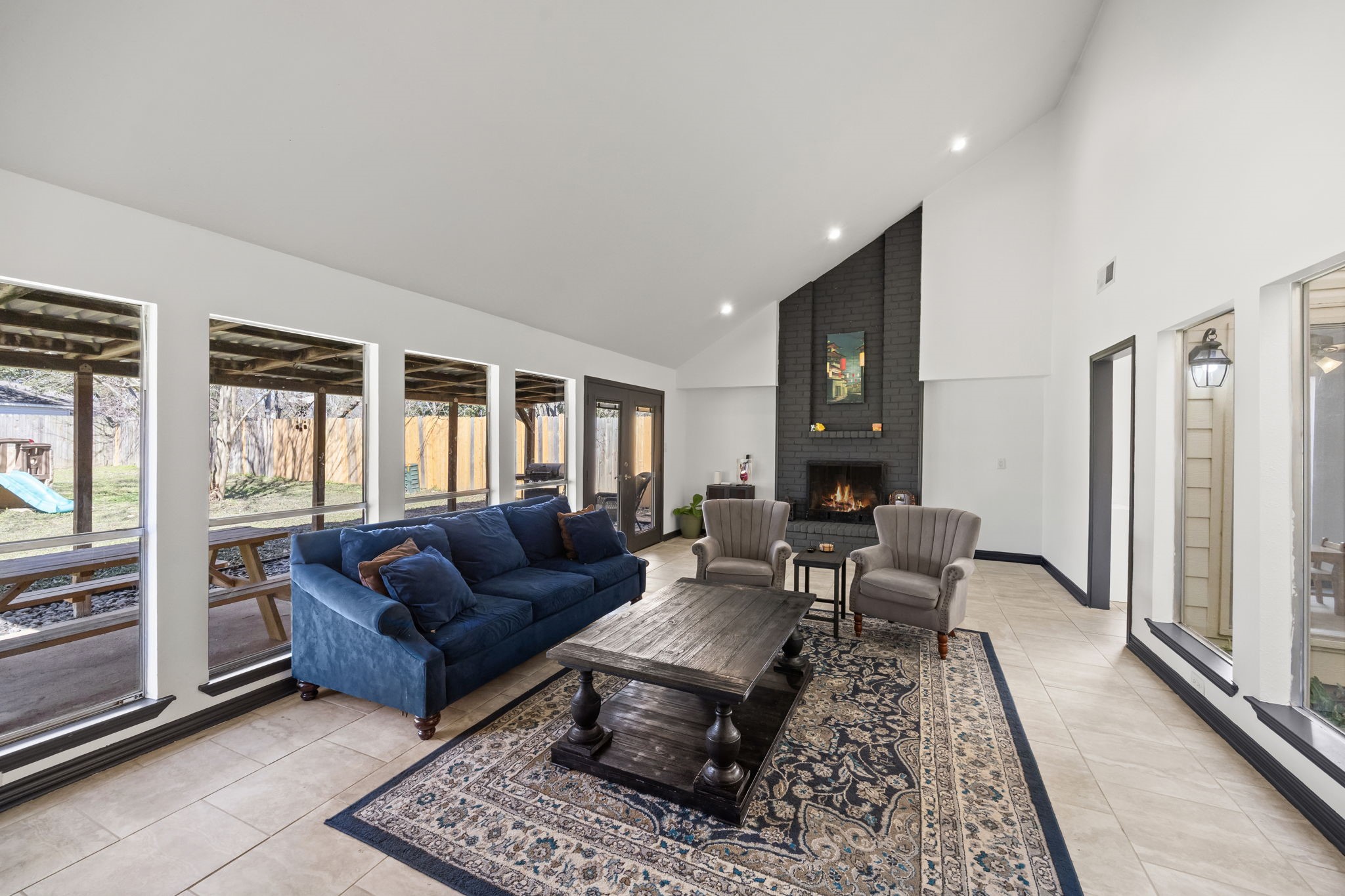 810 Hidden Canyon Road Katy, TX 77450 - Photo 16 of 33 The spacious family room impresses with soaring vaulted ceilings, recessed lighting, and an abundance of windows overlooking the backyard. Tile flooring throughout enhances durability and continuity, while the open layout allows for flexible furniture arrangements.