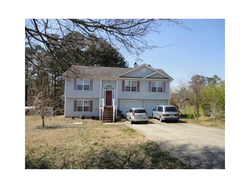 Exterior Front. ALMOST AN AC. LOT