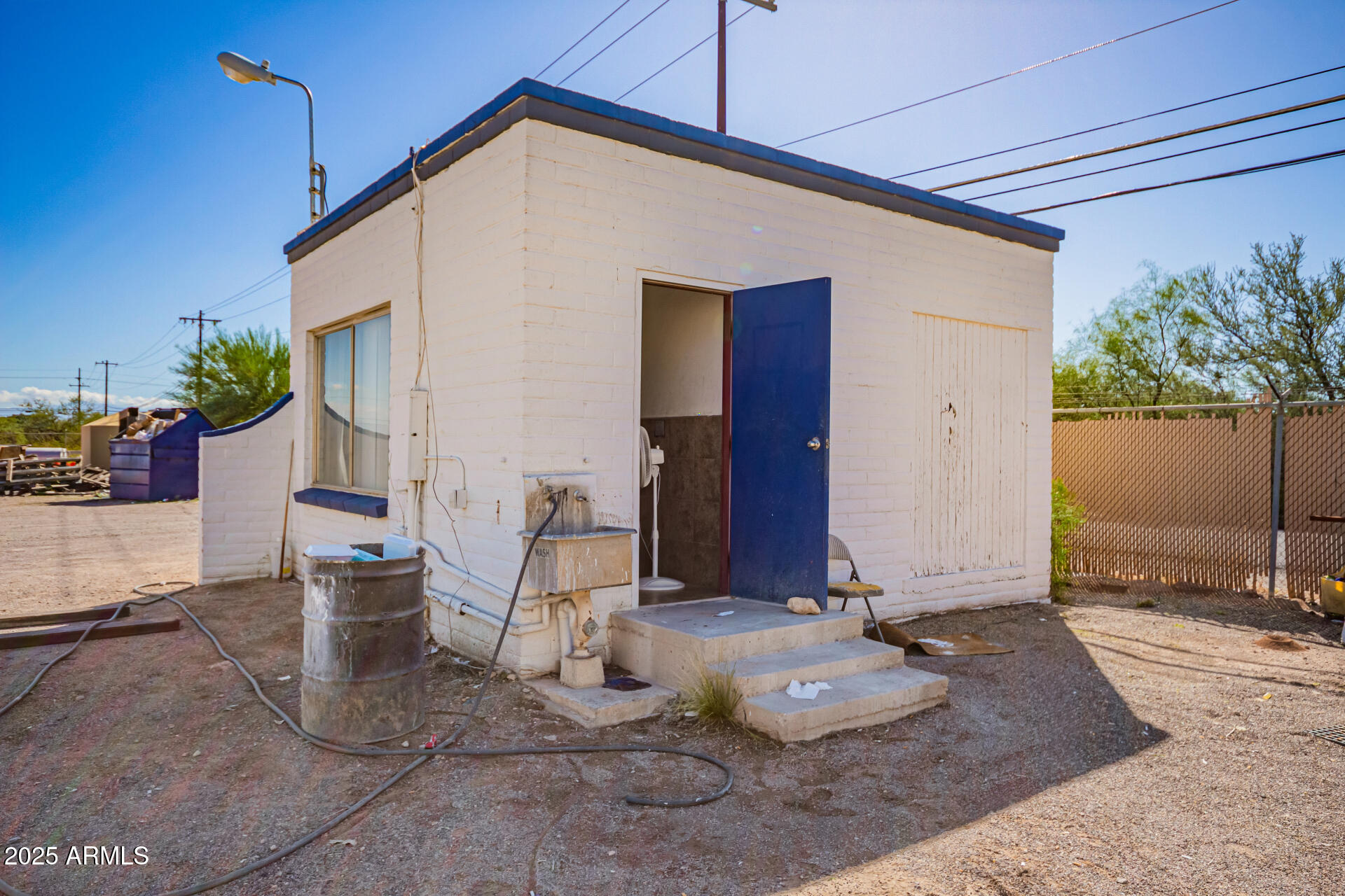 2925 East Ganley Road, Unit 121 Tucson, AZ 85706 - Photo 22 of 45 a view of a house with backyard
