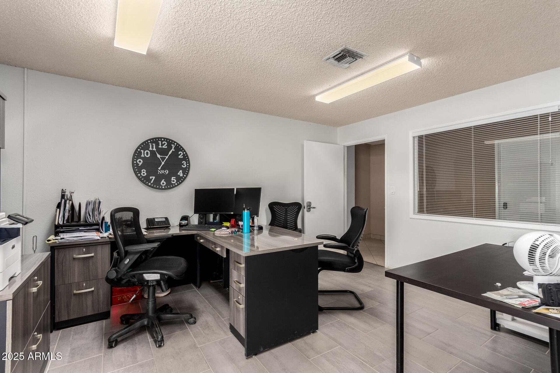 2925 East Ganley Road, Unit 121 Tucson, AZ 85706 - Photo 36 of 45 a view of a workspace with furniture