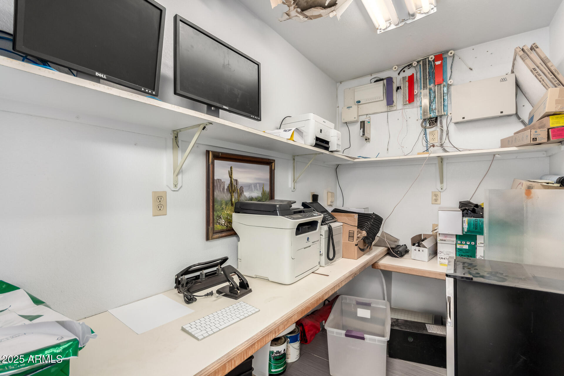 2925 East Ganley Road, Unit 121 Tucson, AZ 85706 - Photo 40 of 45 a kitchen with a sink a stove and cabinets