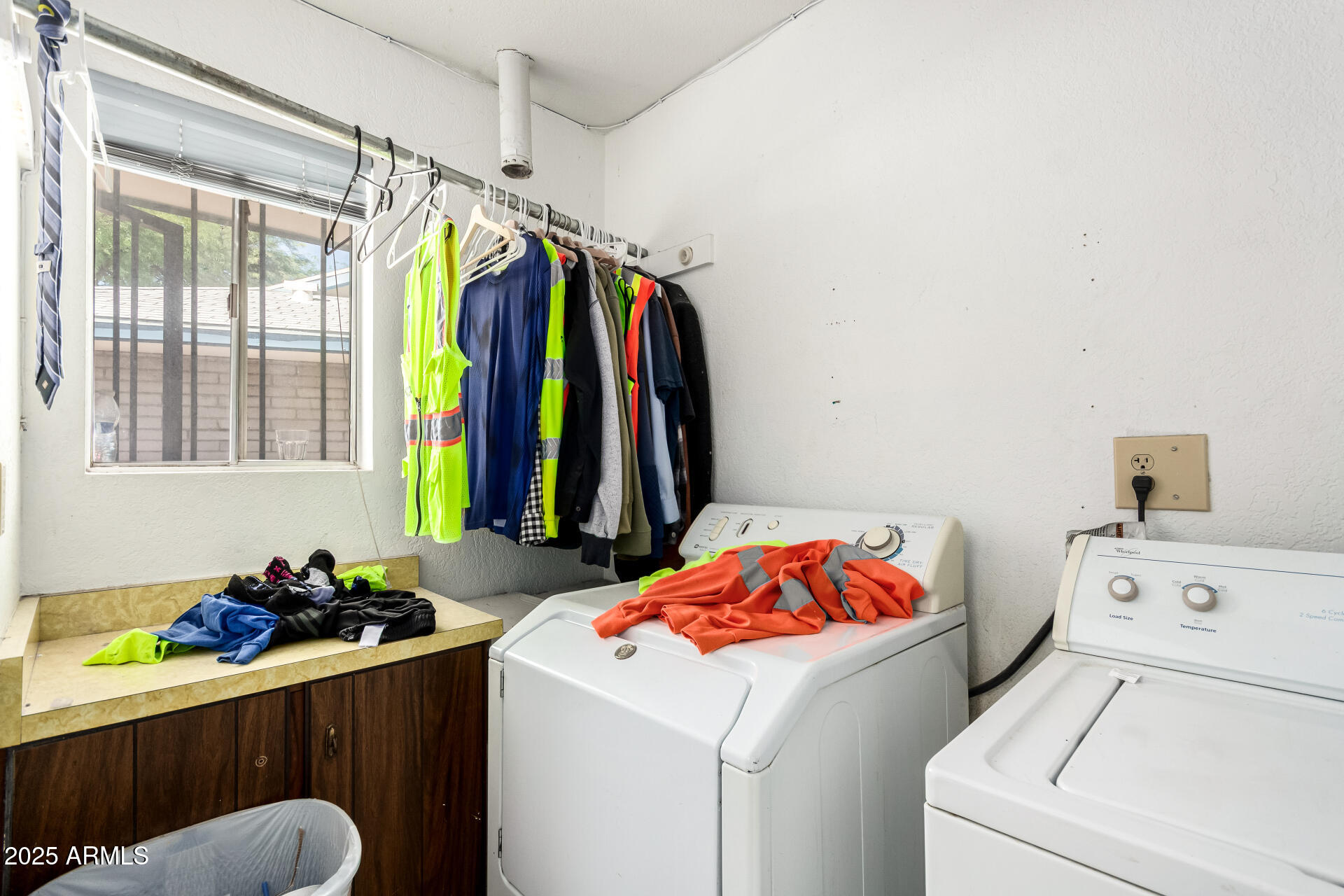 2925 East Ganley Road, Unit 121 Tucson, AZ 85706 - Photo 43 of 45 a utility room with dryer and washer