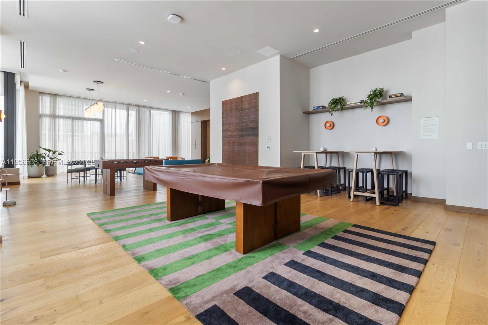 11 Northeast 6th Street, Unit 1513 Miami, FL 33132 - Photo 23 of 44 a lobby with furniture and wooden floor