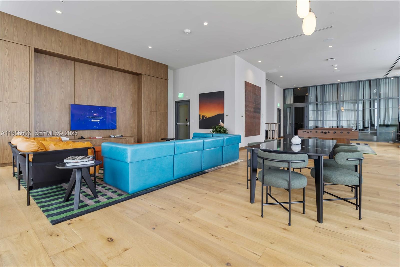 11 Northeast 6th Street, Unit 1513 Miami, FL 33132 - Photo 24 of 44 a living room with furniture and a wooden floor