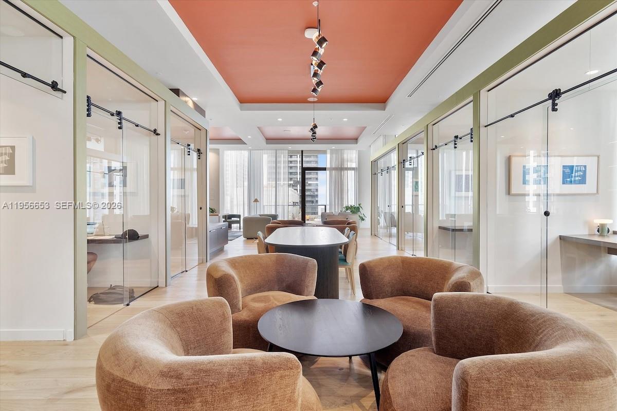 11 Northeast 6th Street, Unit 1513 Miami, FL 33132 - Photo 31 of 44 a large living room with furniture and a large window