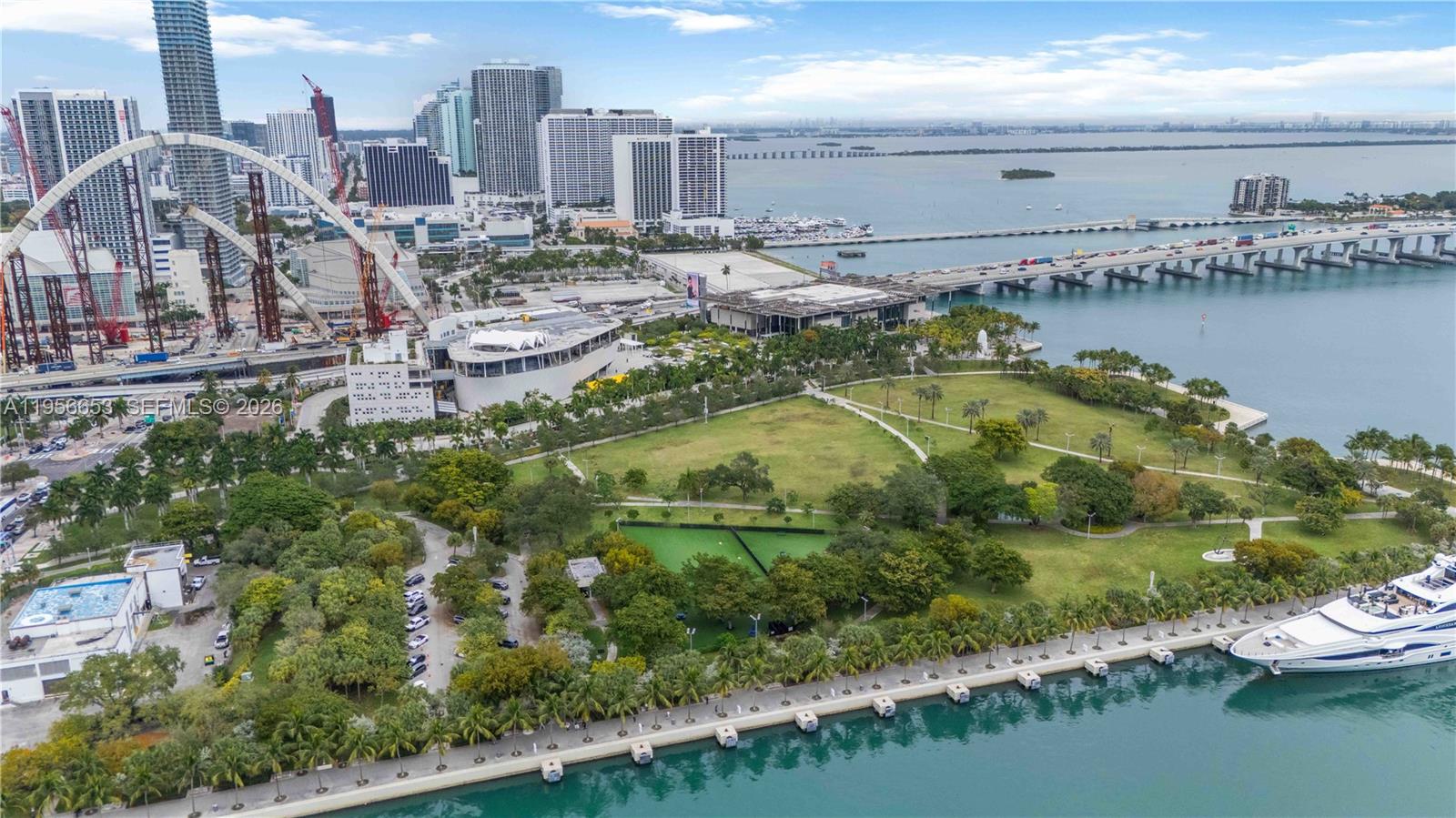11 Northeast 6th Street, Unit 1513 Miami, FL 33132 - Photo 39 of 44 a view of a city with lawn chairs