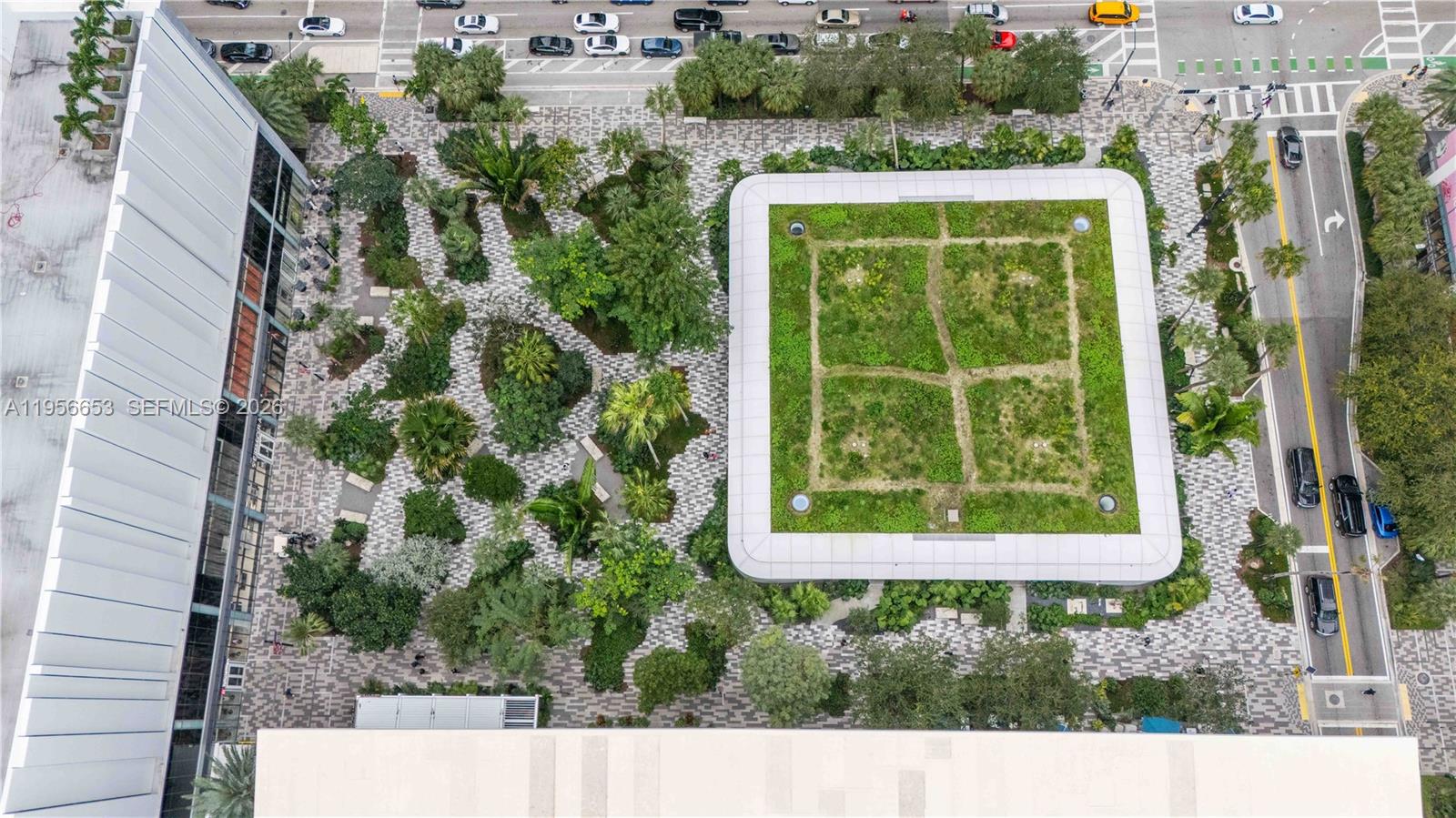 11 Northeast 6th Street, Unit 1513 Miami, FL 33132 - Photo 41 of 44 a view of a bird sitting next to a yard