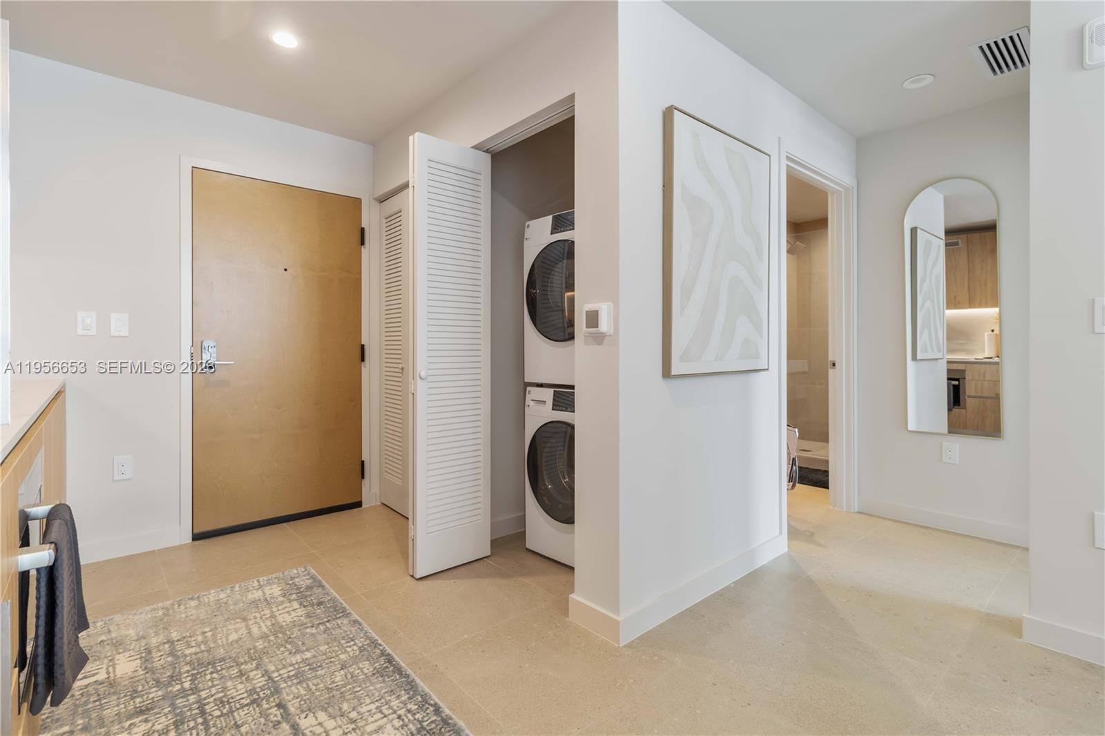 11 Northeast 6th Street, Unit 1513 Miami, FL 33132 - Photo 5 of 44 a view of kitchen and utility room