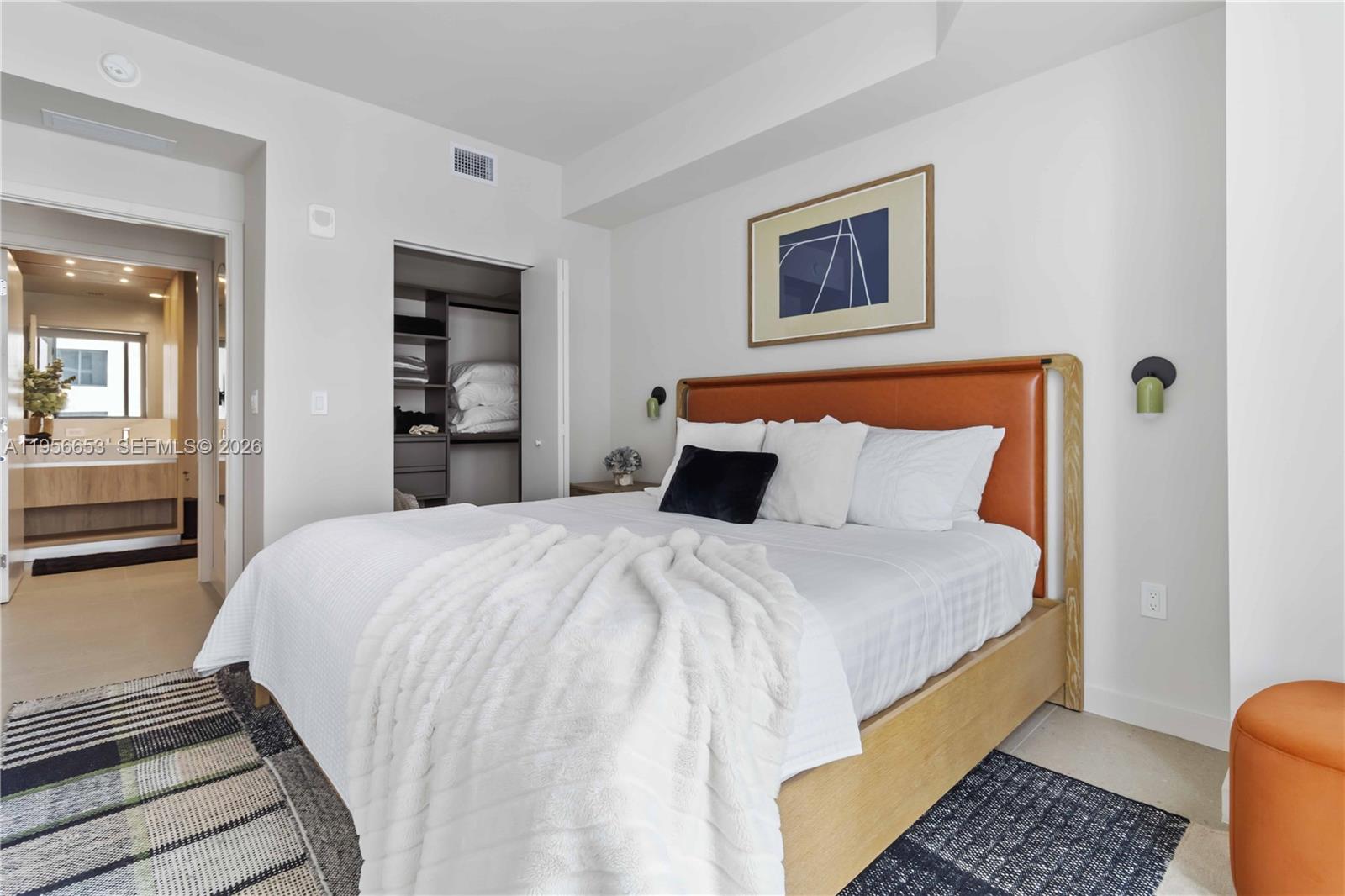 11 Northeast 6th Street, Unit 1513 Miami, FL 33132 - Photo 7 of 44 a bedroom with bed and window