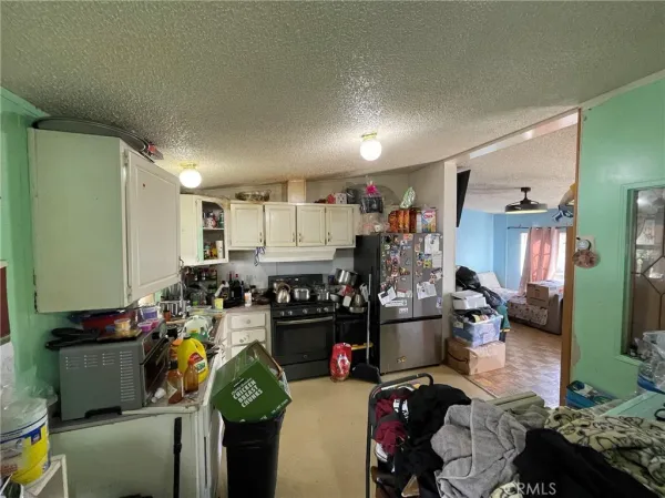 a room with furniture and a chandelier