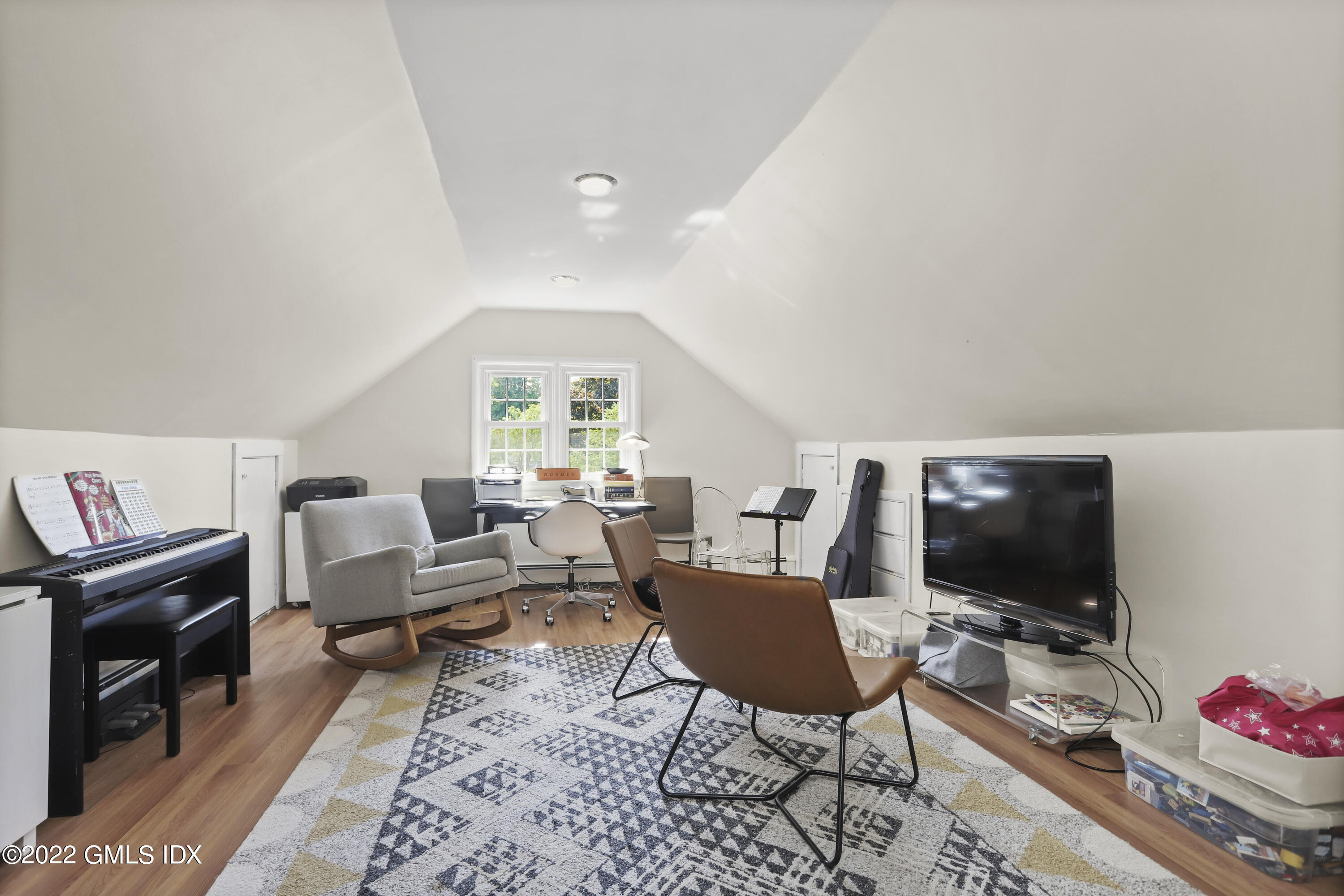 316 Riverside Avenue Riverside, CT 06878 - Photo 11 of 11 a living room with furniture a flat screen tv and a window