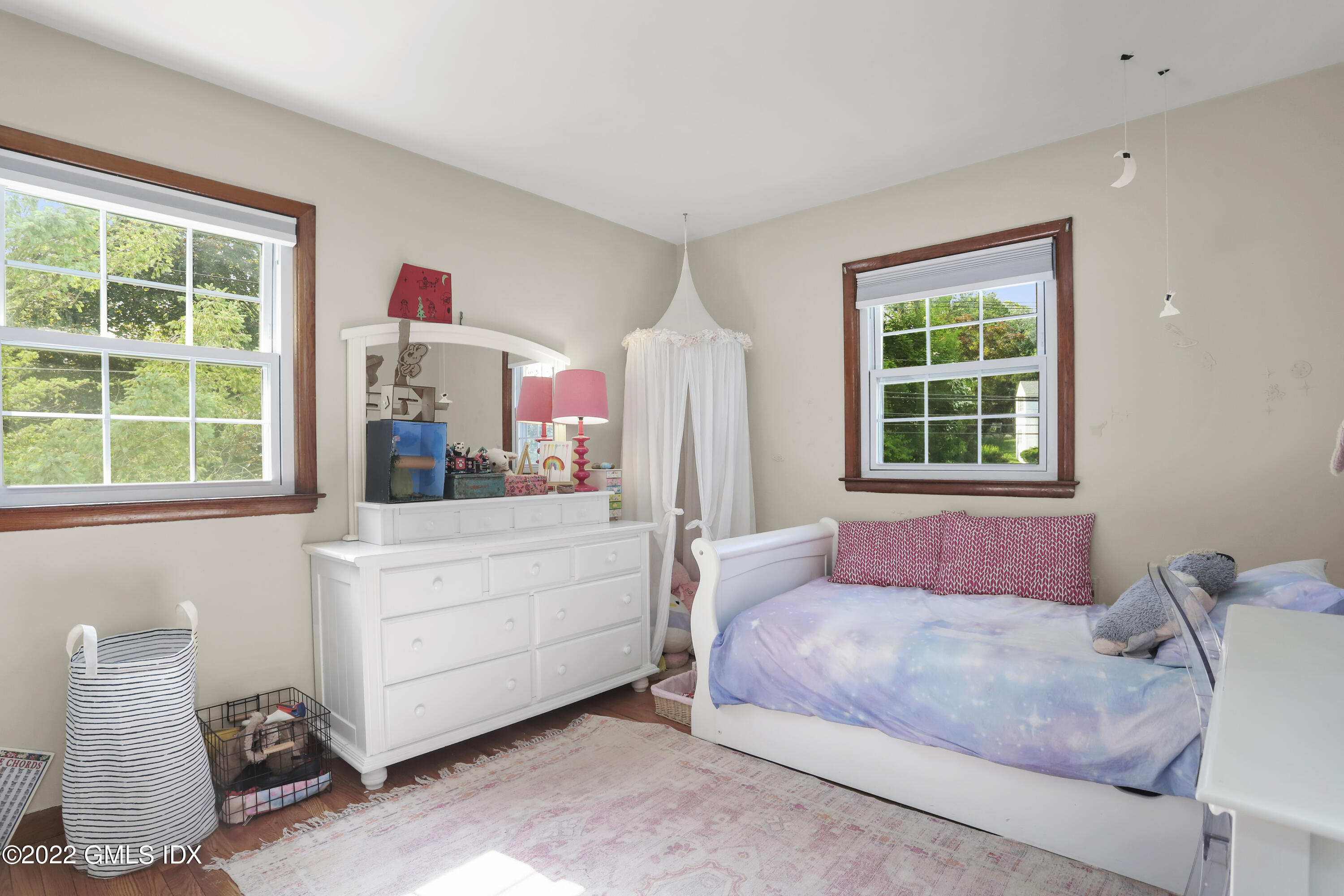 316 Riverside Avenue Riverside, CT 06878 - Photo 9 of 11 a bedroom with a bed and a window