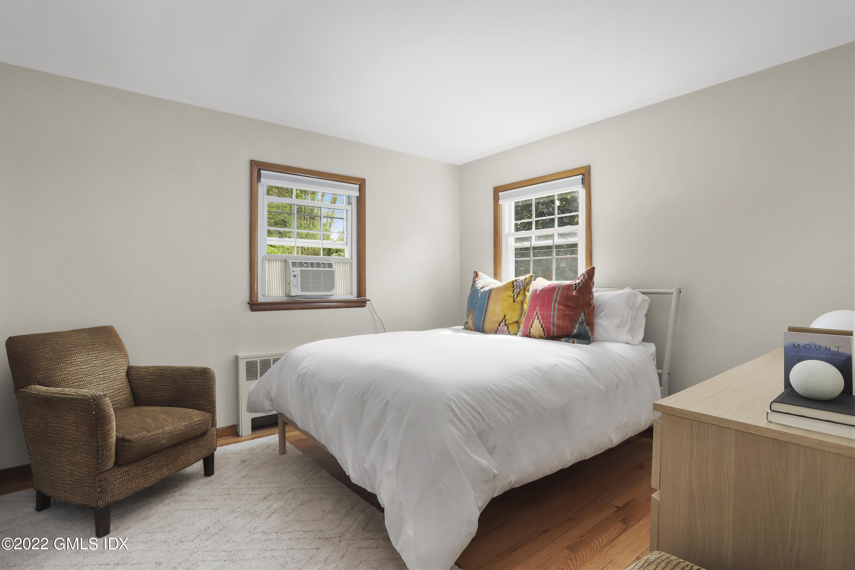 316 Riverside Avenue Riverside, CT 06878 - Photo 10 of 11 a bedroom with a bed couch and a window