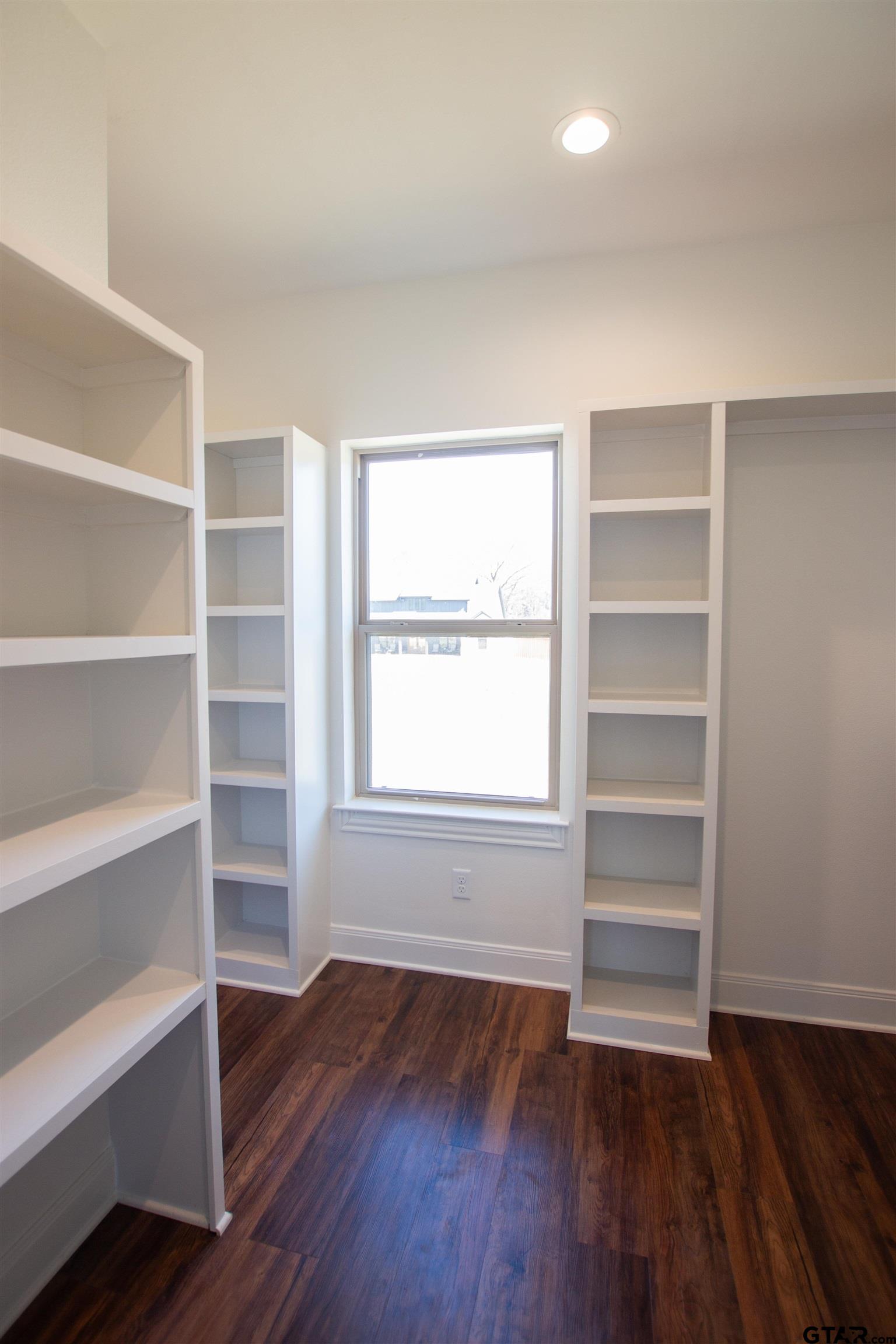 14716 Fallow Lane Tyler, TX 75706 - Photo 20 of 46 a view of room with empty room and wooden floor