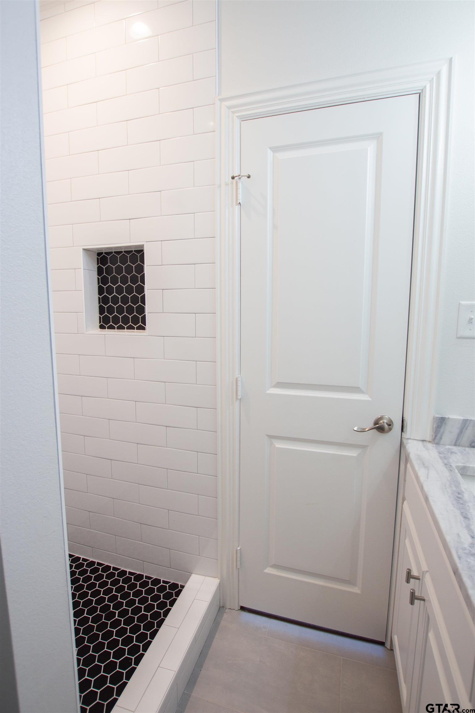 14716 Fallow Lane Tyler, TX 75706 - Photo 36 of 46 a bathroom with a shower
