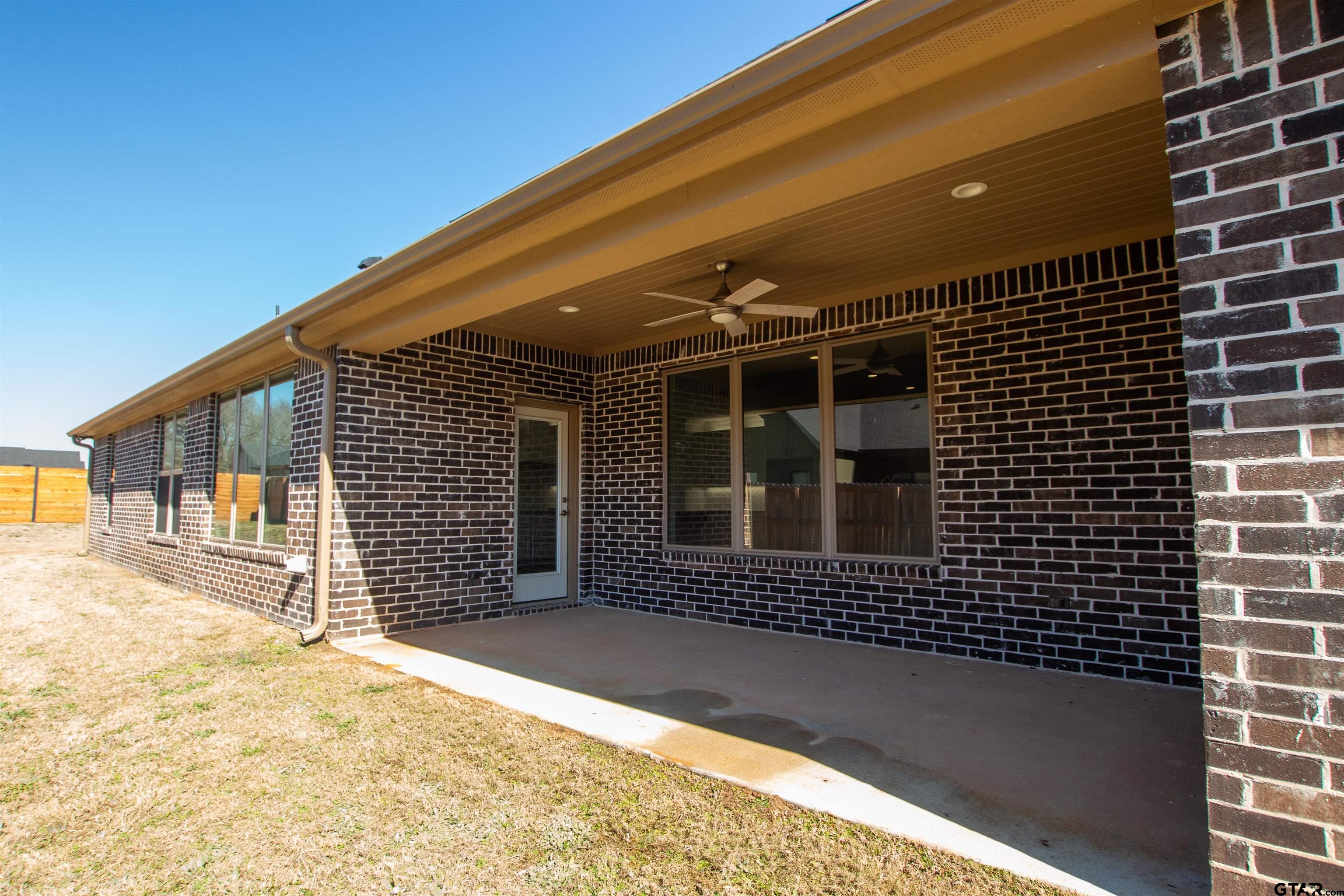 14716 Fallow Lane Tyler, TX 75706 - Photo 40 of 46 a view of a house with a wooden fence