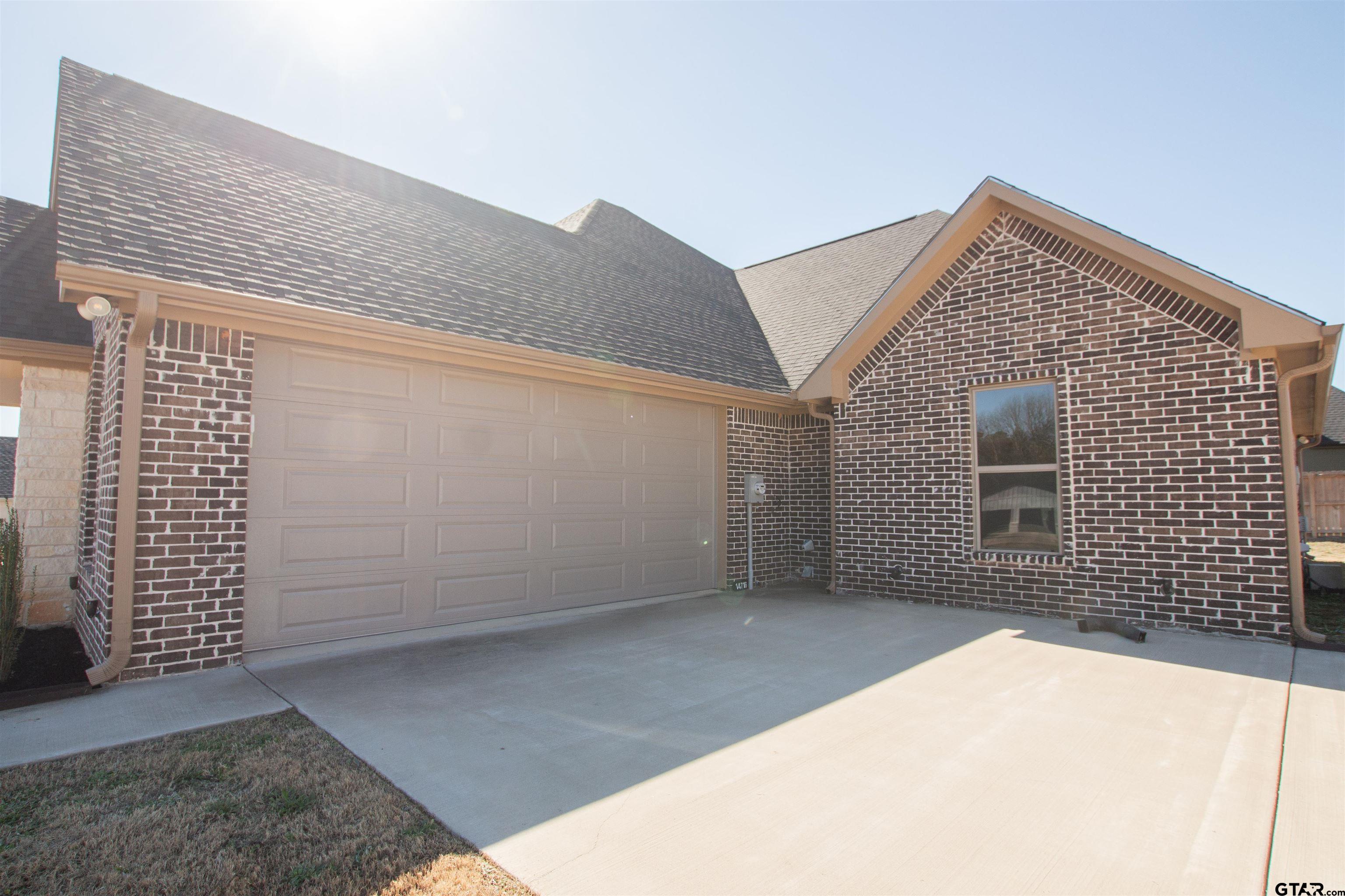 14716 Fallow Lane Tyler, TX 75706 - Photo 43 of 46 a view of a house with a garage