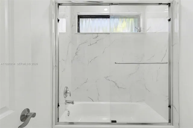 a house view with a sitting space and garden space