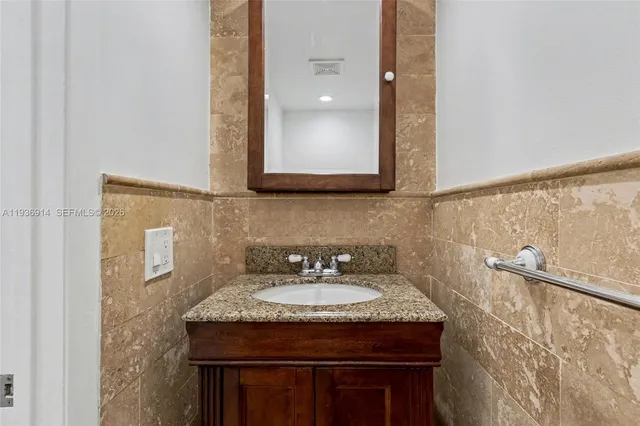 a view of a park and palm trees