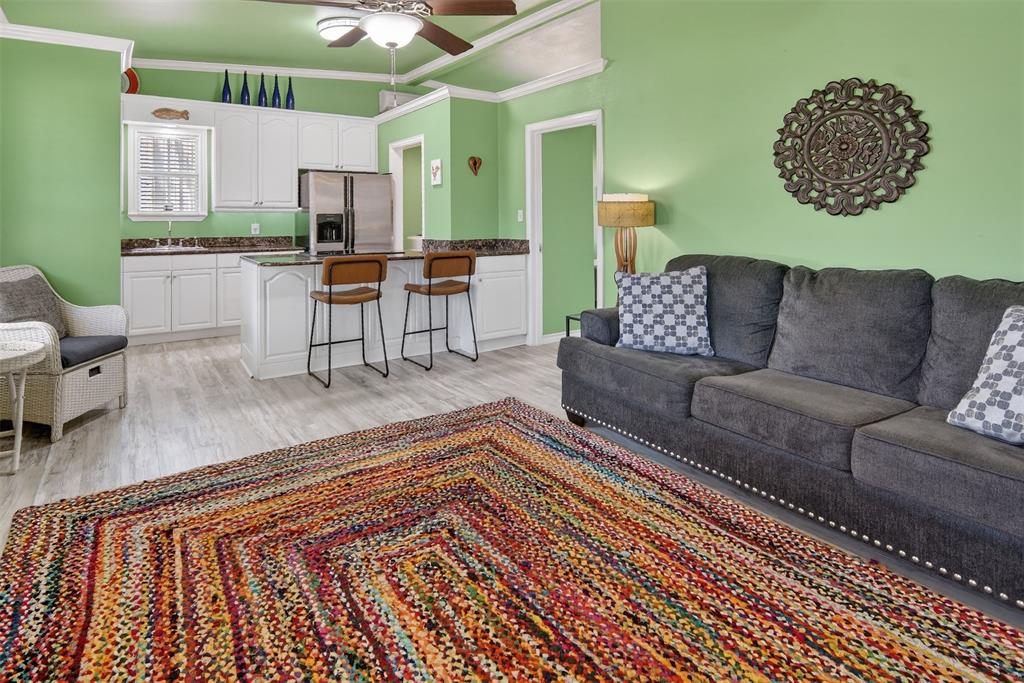 190 County Road 1975 Yantis, TX 75497 - Photo 10 of 36 a living room with furniture and a rug