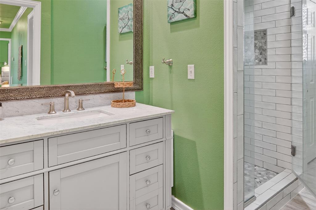 190 County Road 1975 Yantis, TX 75497 - Photo 21 of 36 a bathroom with a sink and a mirror