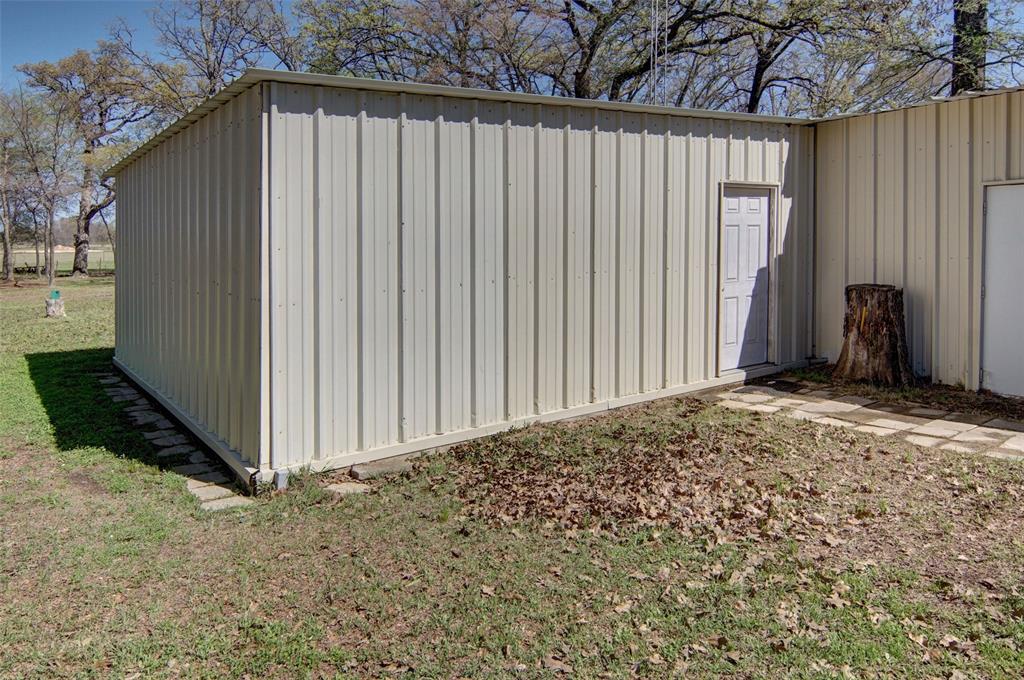 190 County Road 1975 Yantis, TX 75497 - Photo 29 of 36 a backyard of a house