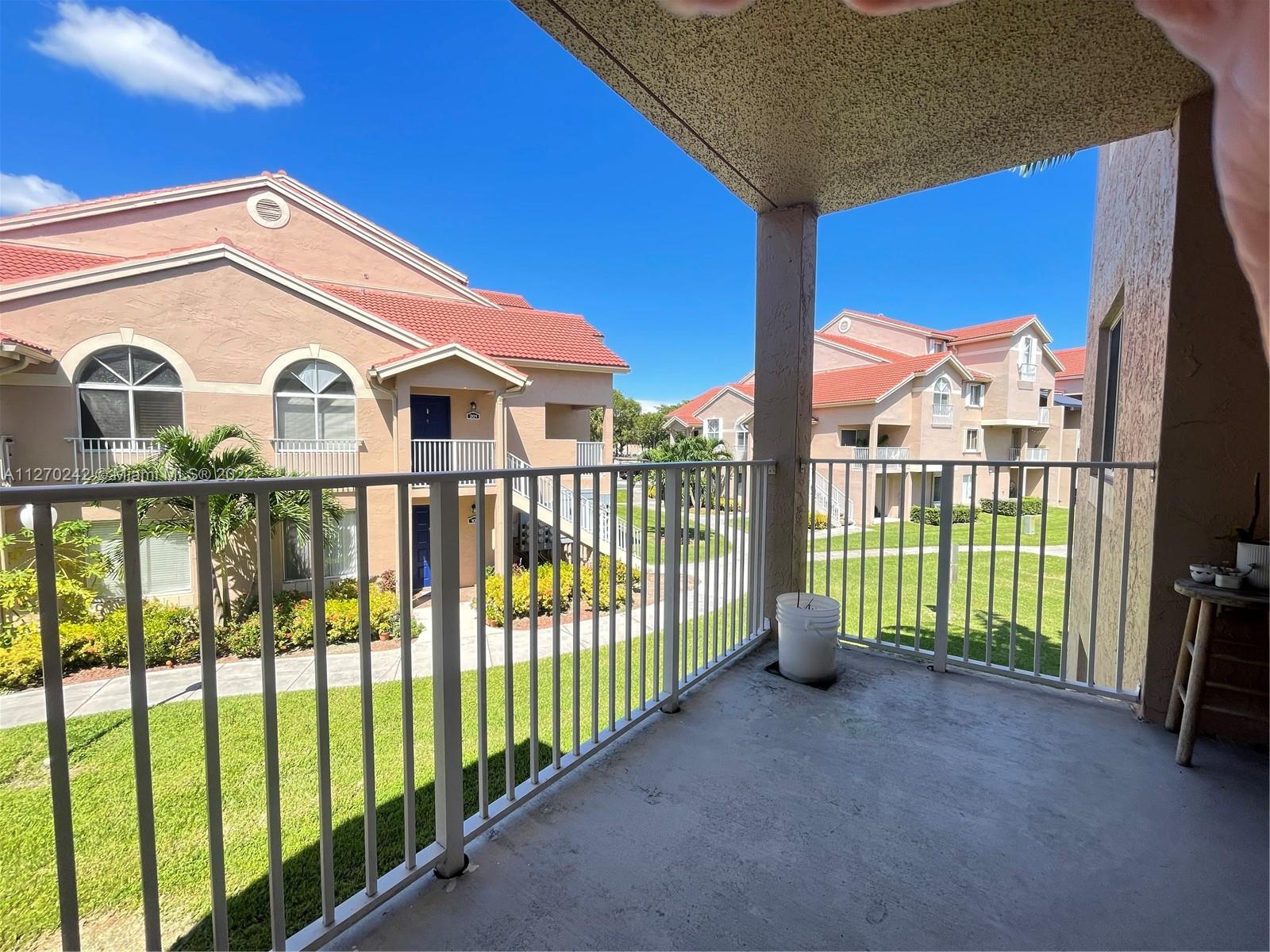 The Hammocks Miami, FL 33196 - Photo 14 of 21 a view of a house with a balcony
