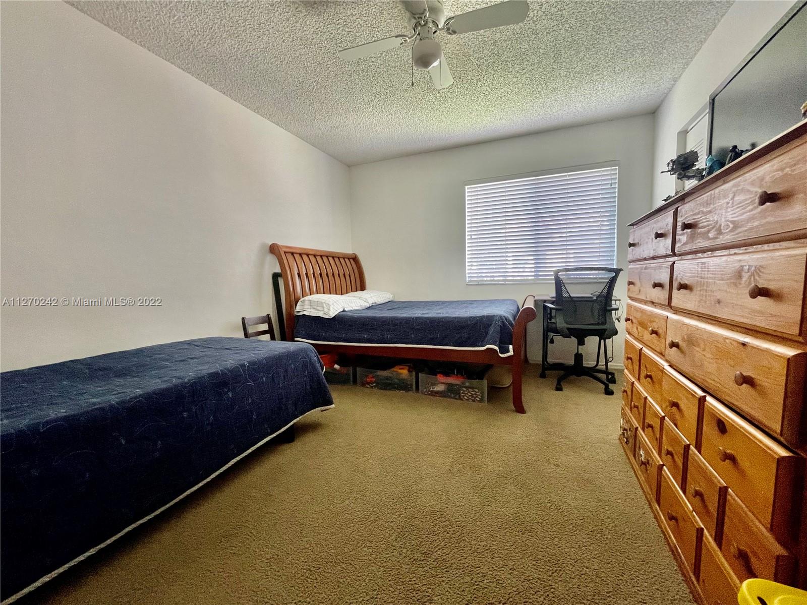 The Hammocks Miami, FL 33196 - Photo 6 of 21 a bedroom with furniture and a window