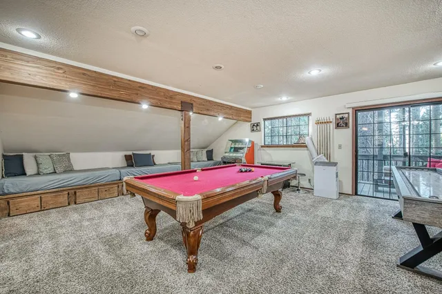 a bed room with a bed and a couch